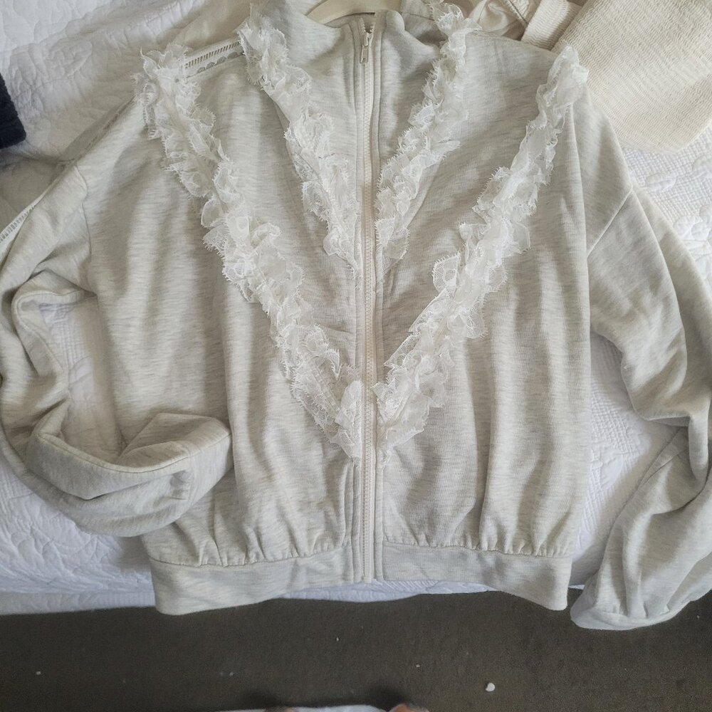 Anthropologie zip up jacket with white lace